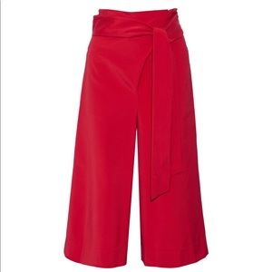Tibi’s Cropped stretch-faille wide-leg pants, red